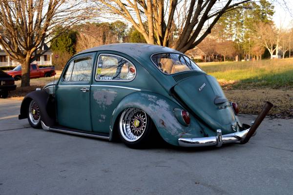 Ugly slammed Beetle with horrible camber and a stinger